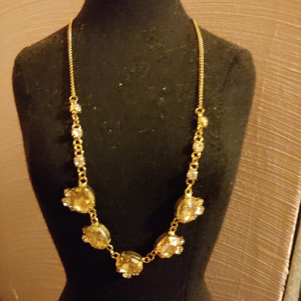 Gold necklace and earring set.